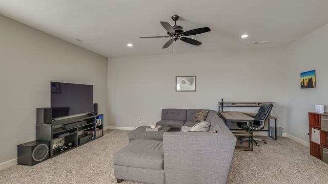 a view of a house with a yard and plants