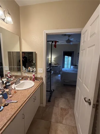 a view of an empty room and a window