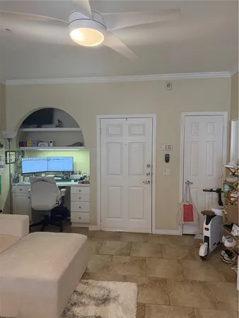 a bedroom with a bed and a chair
