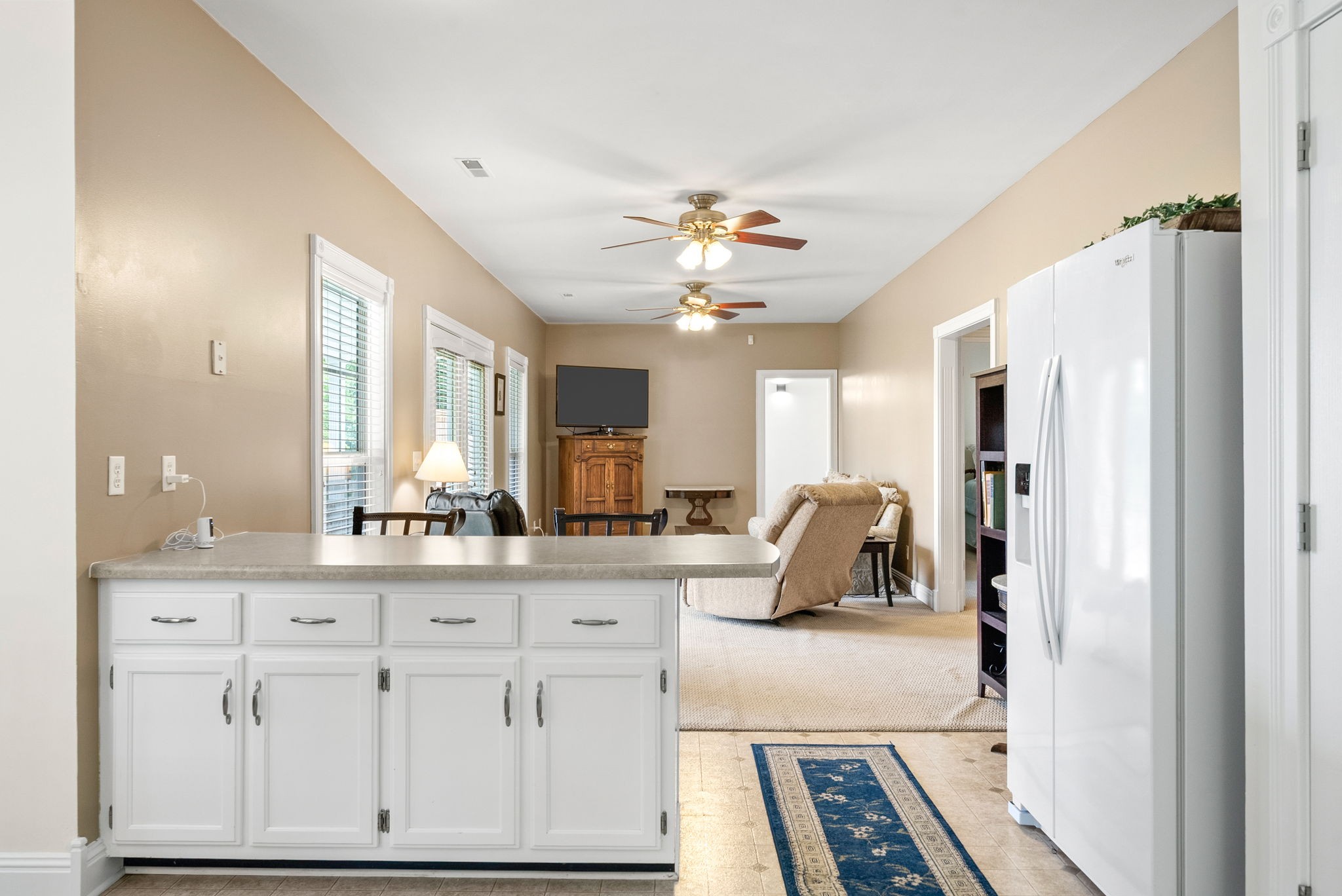 196 Wildlife Road Dover, TN 37058 - Photo 21 of 98 a view of living room with granite countertop furniture and a flat screen tv