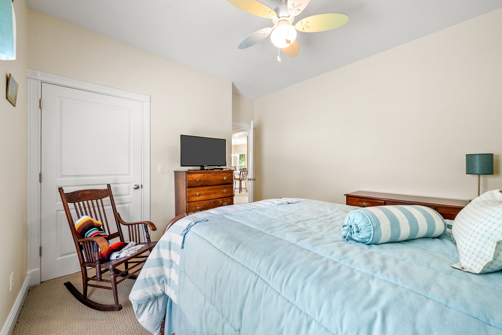 196 Wildlife Road Dover, TN 37058 - Photo 24 of 98 a bedroom with a bed and a chandelier