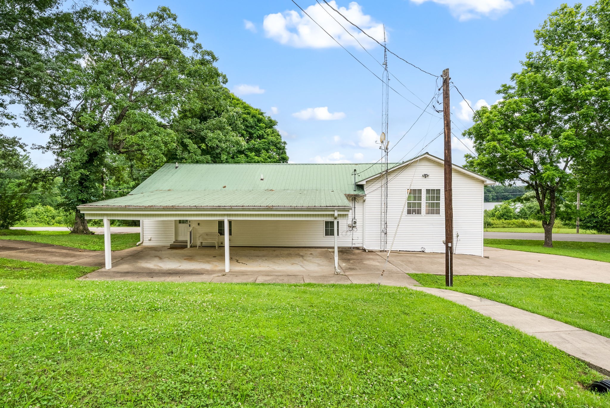 196 Wildlife Road Dover, TN 37058 - Photo 50 of 98 a view of a house with a yard and sitting area