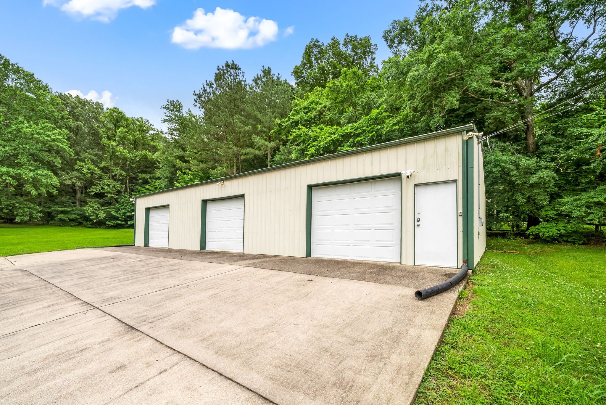 196 Wildlife Road Dover, TN 37058 - Photo 55 of 98 a backyard of a house with lots of green space