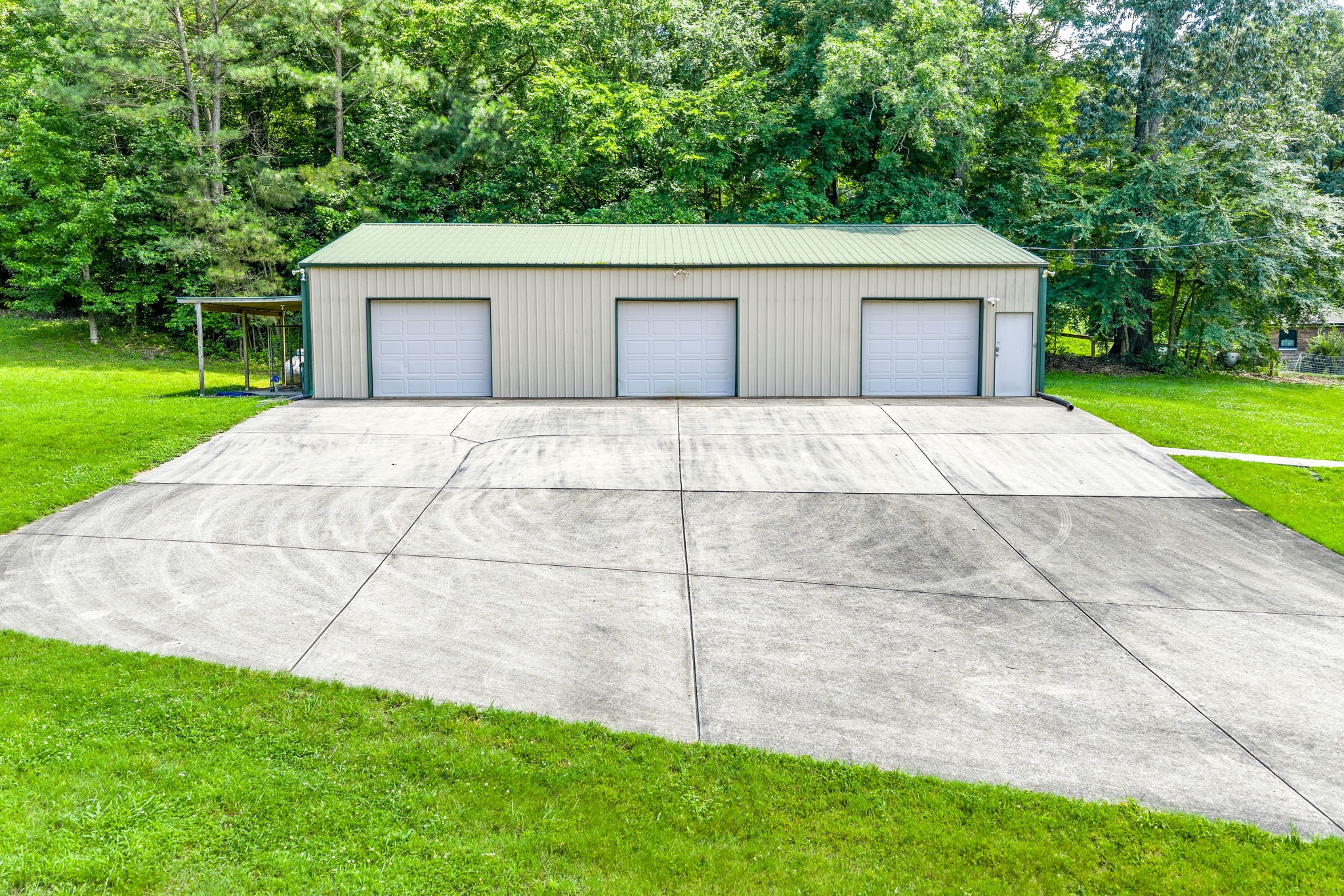 196 Wildlife Road Dover, TN 37058 - Photo 56 of 98 a view of a backyard with a garden