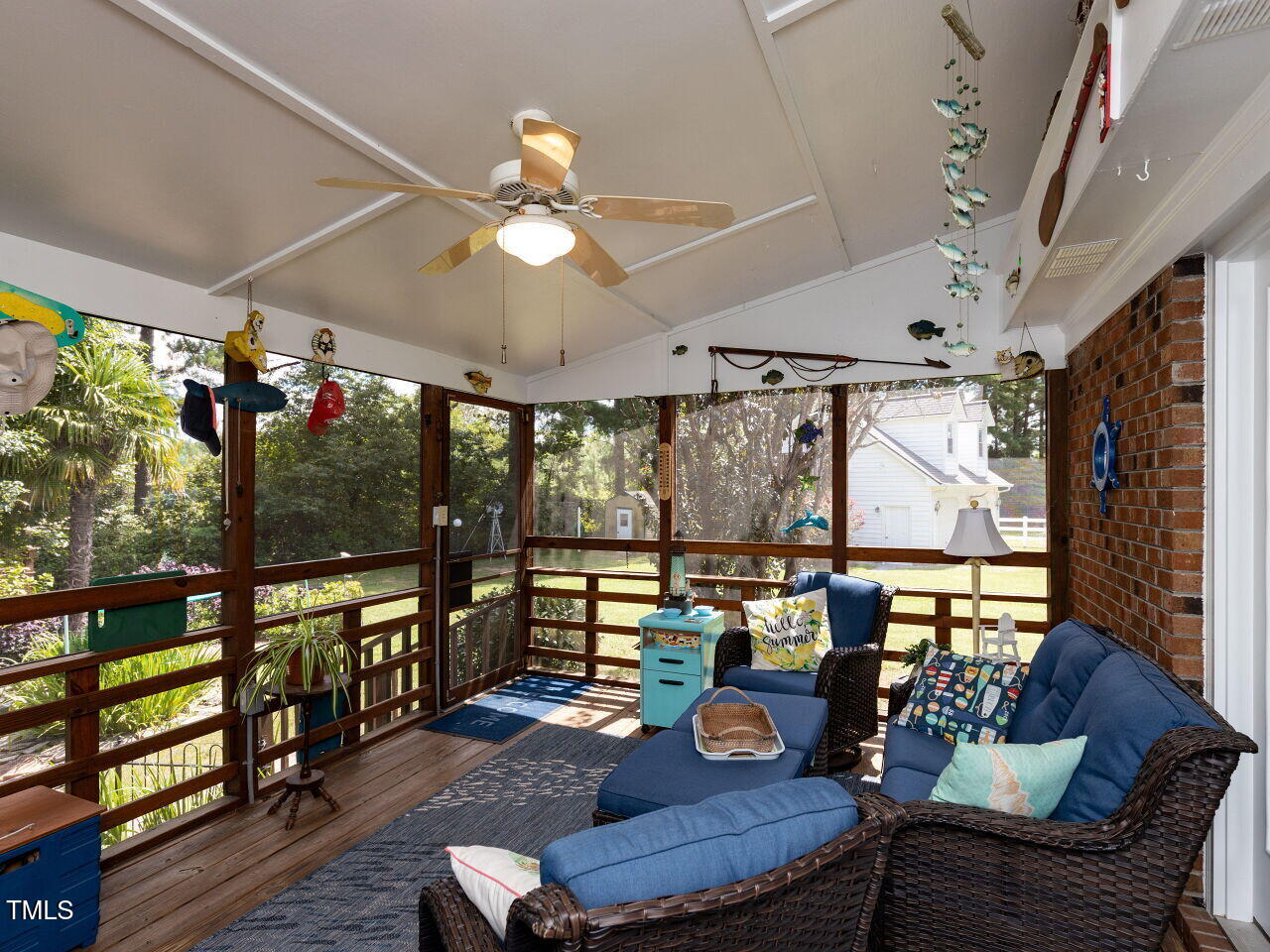 1025 Lake Path Road Willow Spring, NC 27592 - Photo 20 of 30 a view of a dining room with furniture window and outside view