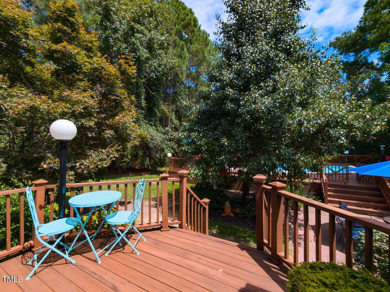1025 Lake Path Road Willow Spring, NC 27592 - Photo 22 of 30 a view of a chairs and table on the wooden floor