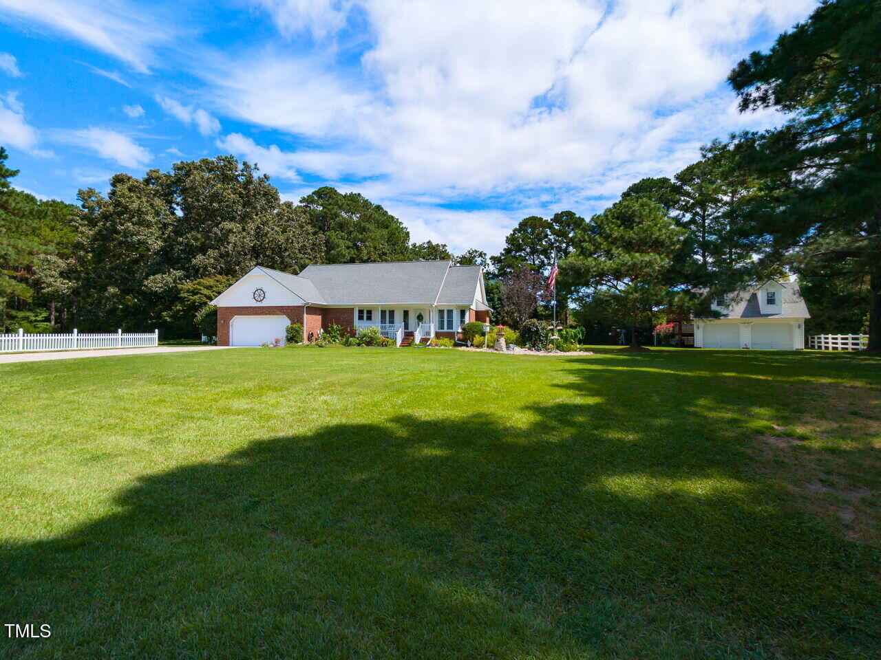 1025 Lake Path Road Willow Spring, NC 27592 - Photo 3 of 30 a view of a house with a big yard