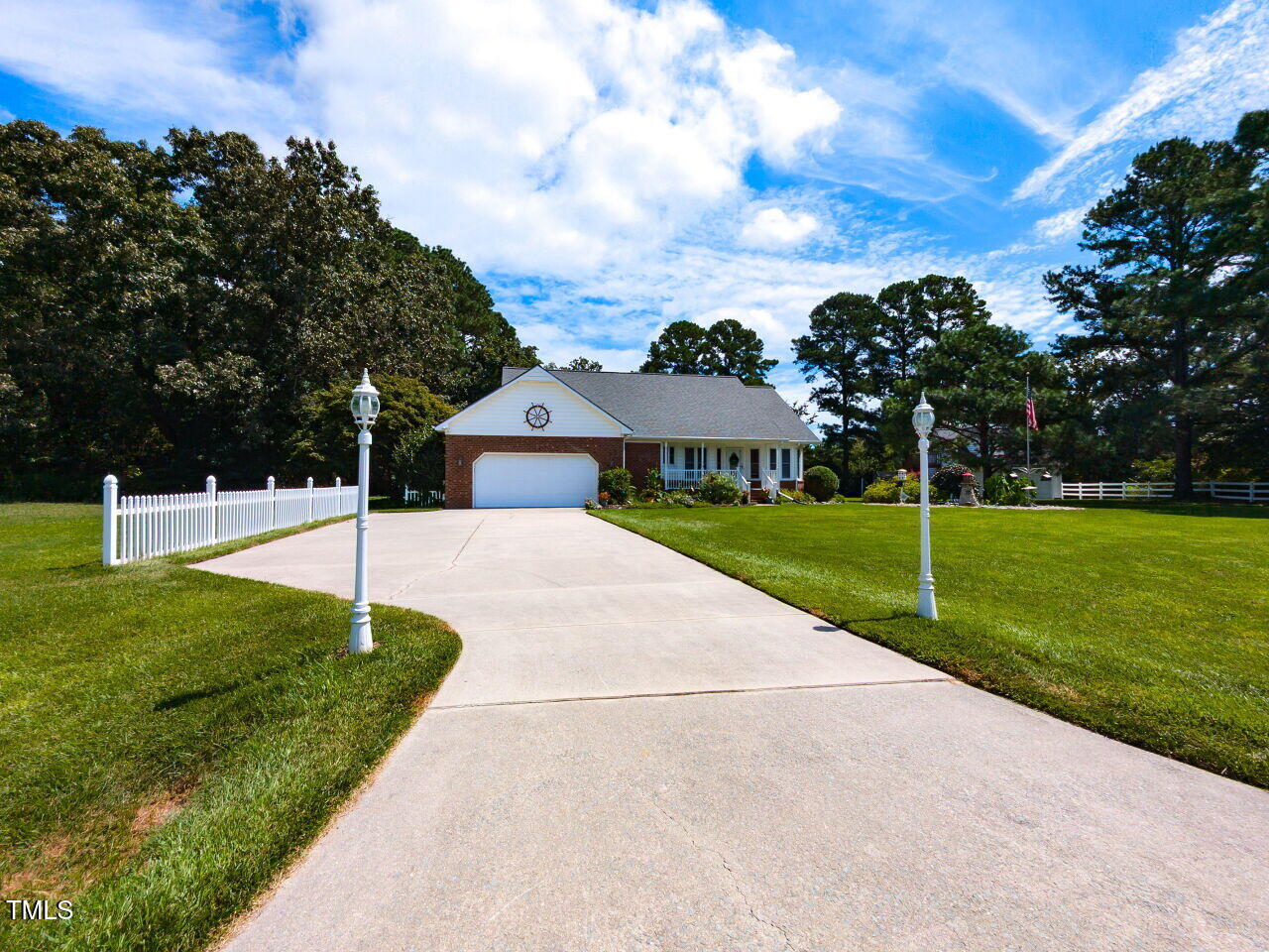 1025 Lake Path Road Willow Spring, NC 27592 - Photo 4 of 30 a view of house with garden