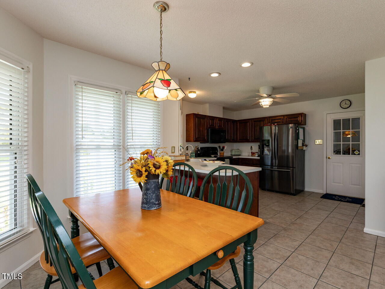 1025 Lake Path Road Willow Spring, NC 27592 - Photo 8 of 30 a view of a dining room with furniture