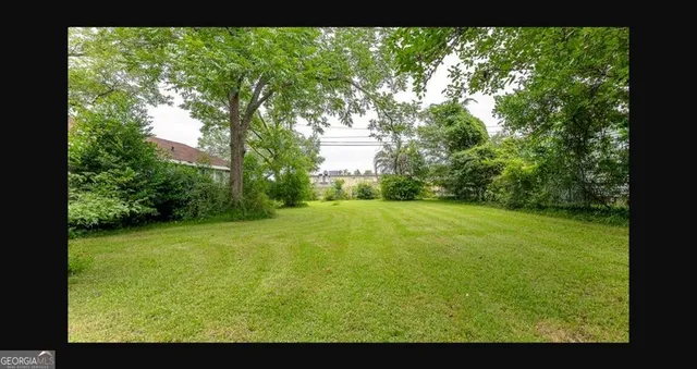 a view of outdoor space and yard