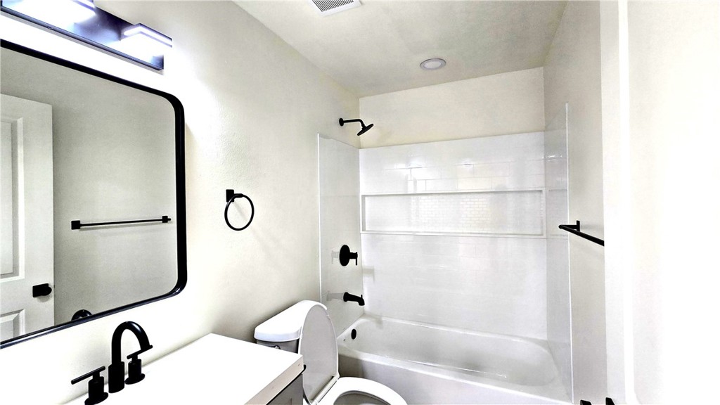 15917 Prairie Avenue, Unit 2 Lawndale, CA 90260 - Photo 4 of 10 a bathroom with a bathtub and a shower