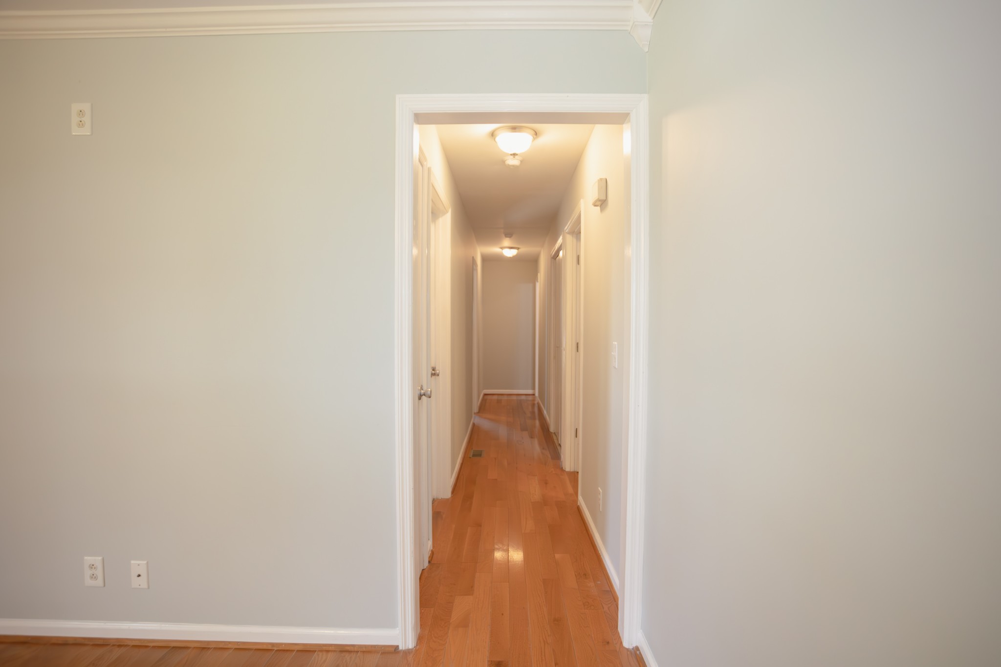 1052 Randy Road Ashland City, TN 37015 - Photo 17 of 30 a view of a hallway with wooden floor