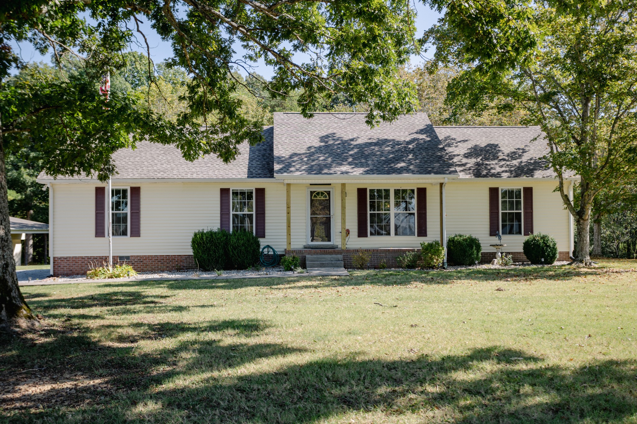 1052 Randy Road Ashland City, TN 37015 - Photo 2 of 30 a front view of a house with a yard
