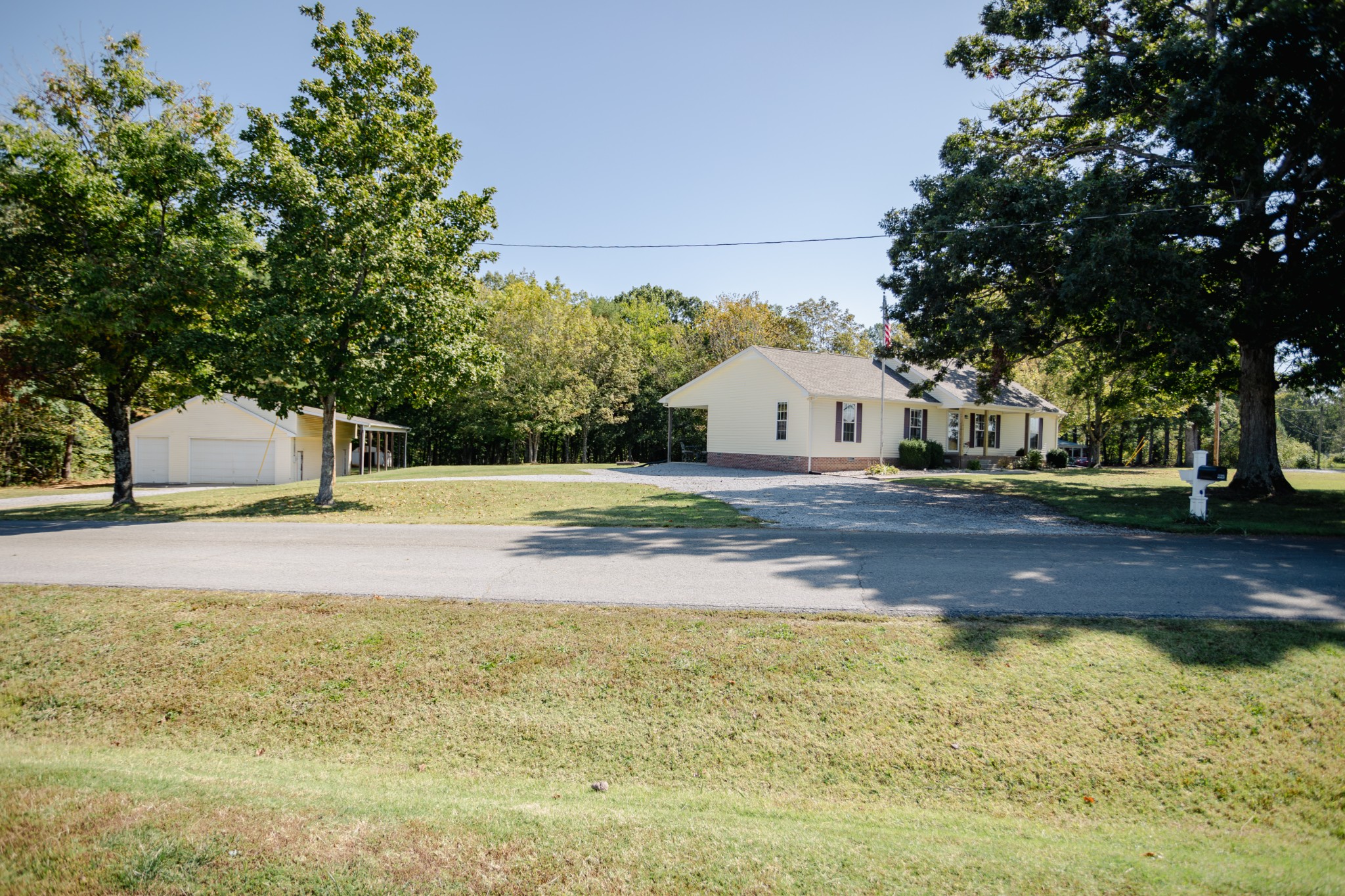 1052 Randy Road Ashland City, TN 37015 - Photo 25 of 30 a view of yard with swimming pool and trees
