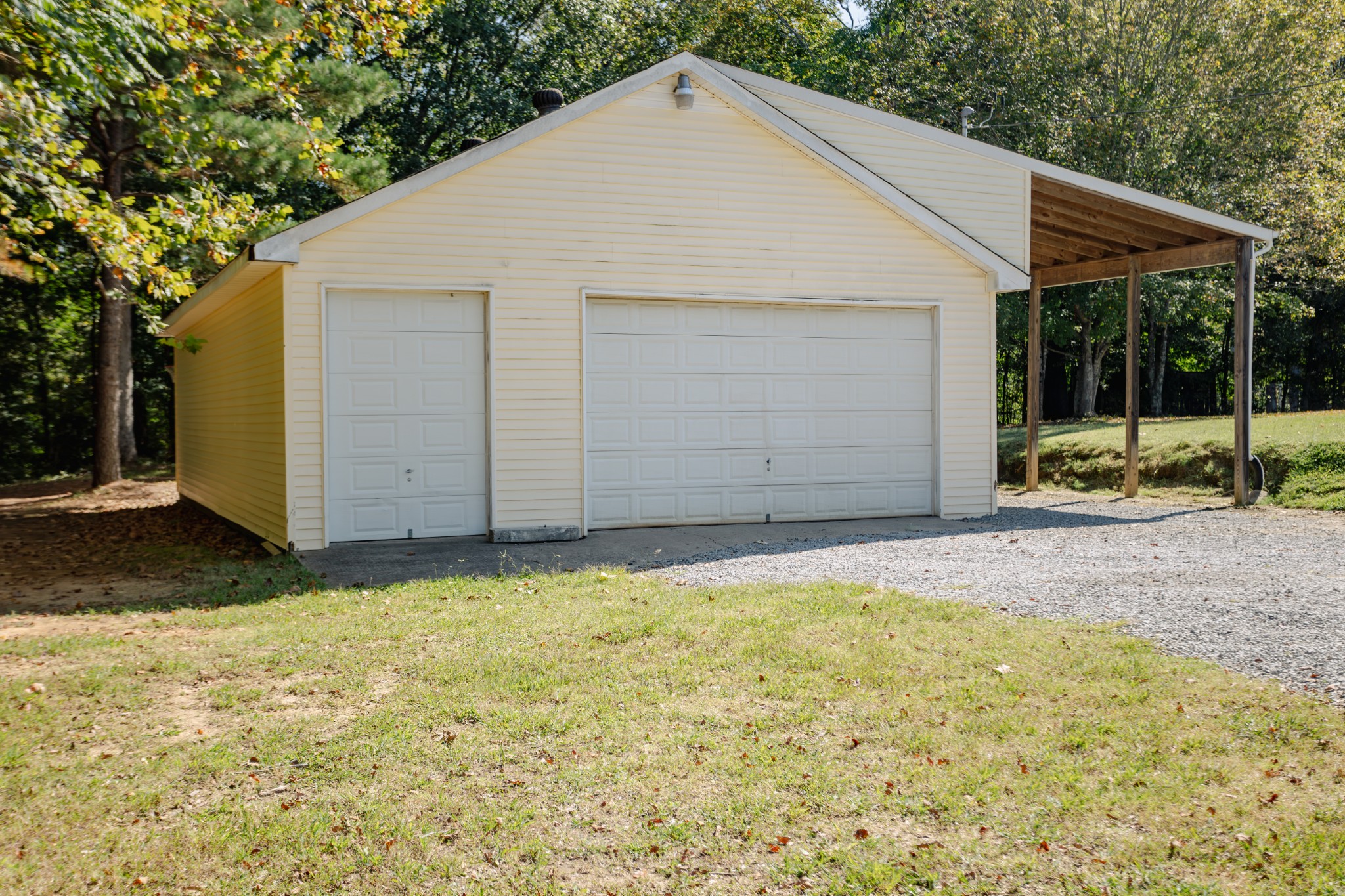1052 Randy Road Ashland City, TN 37015 - Photo 27 of 30 a view of a white house with a yard