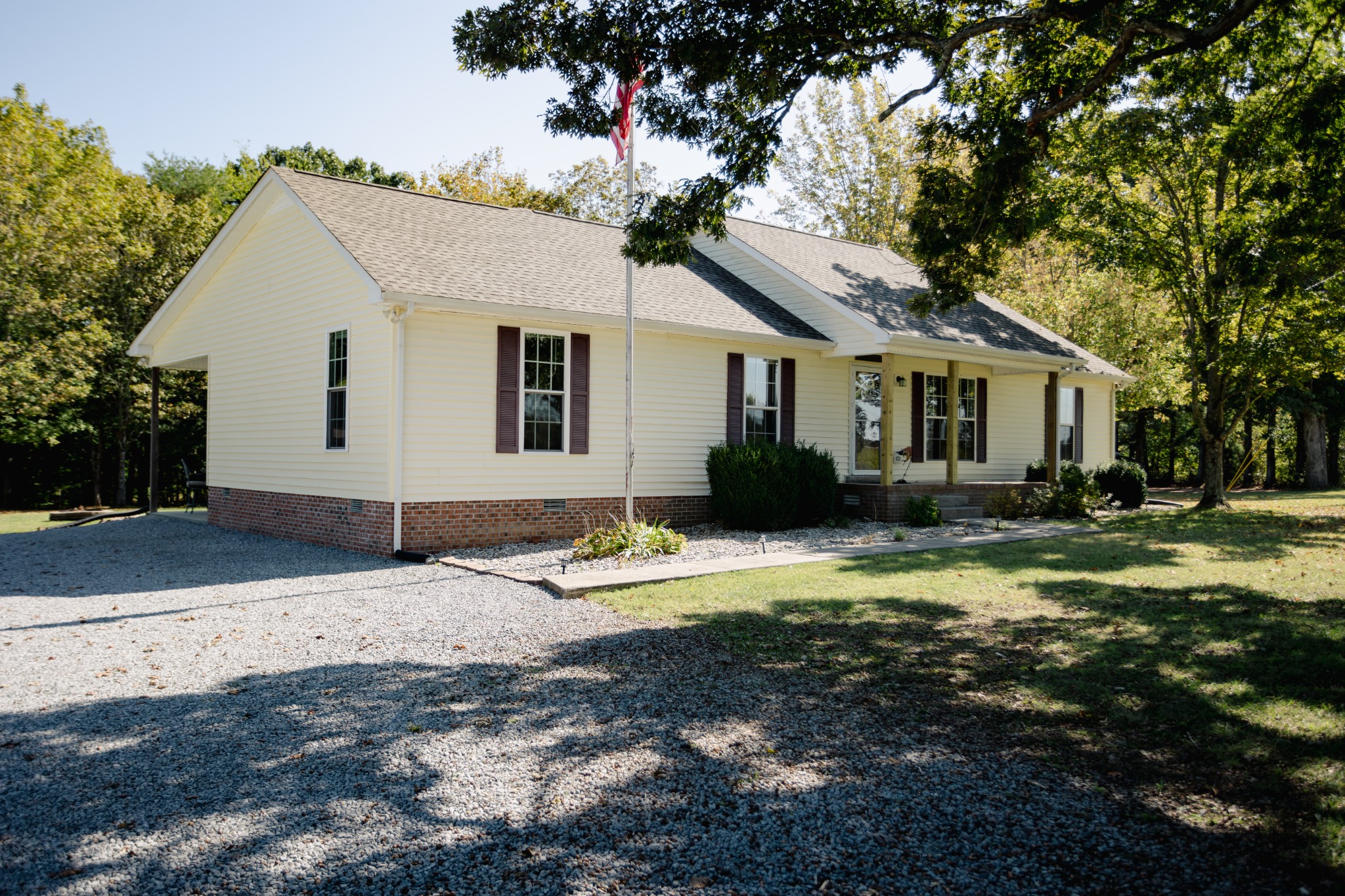 1052 Randy Road Ashland City, TN 37015 - Photo 3 of 30 a white house with a large tree in front of it