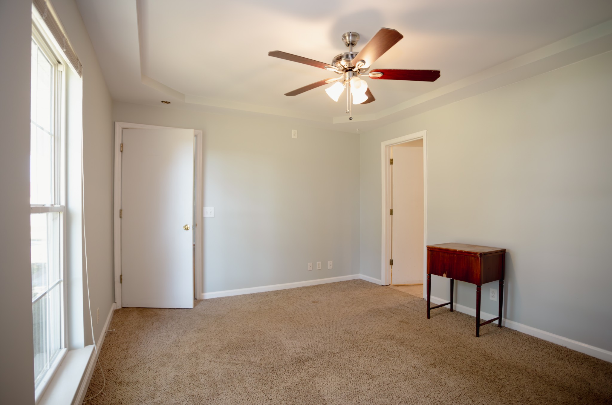 1052 Randy Road Ashland City, TN 37015 - Photo 8 of 30 an empty room with windows and fan