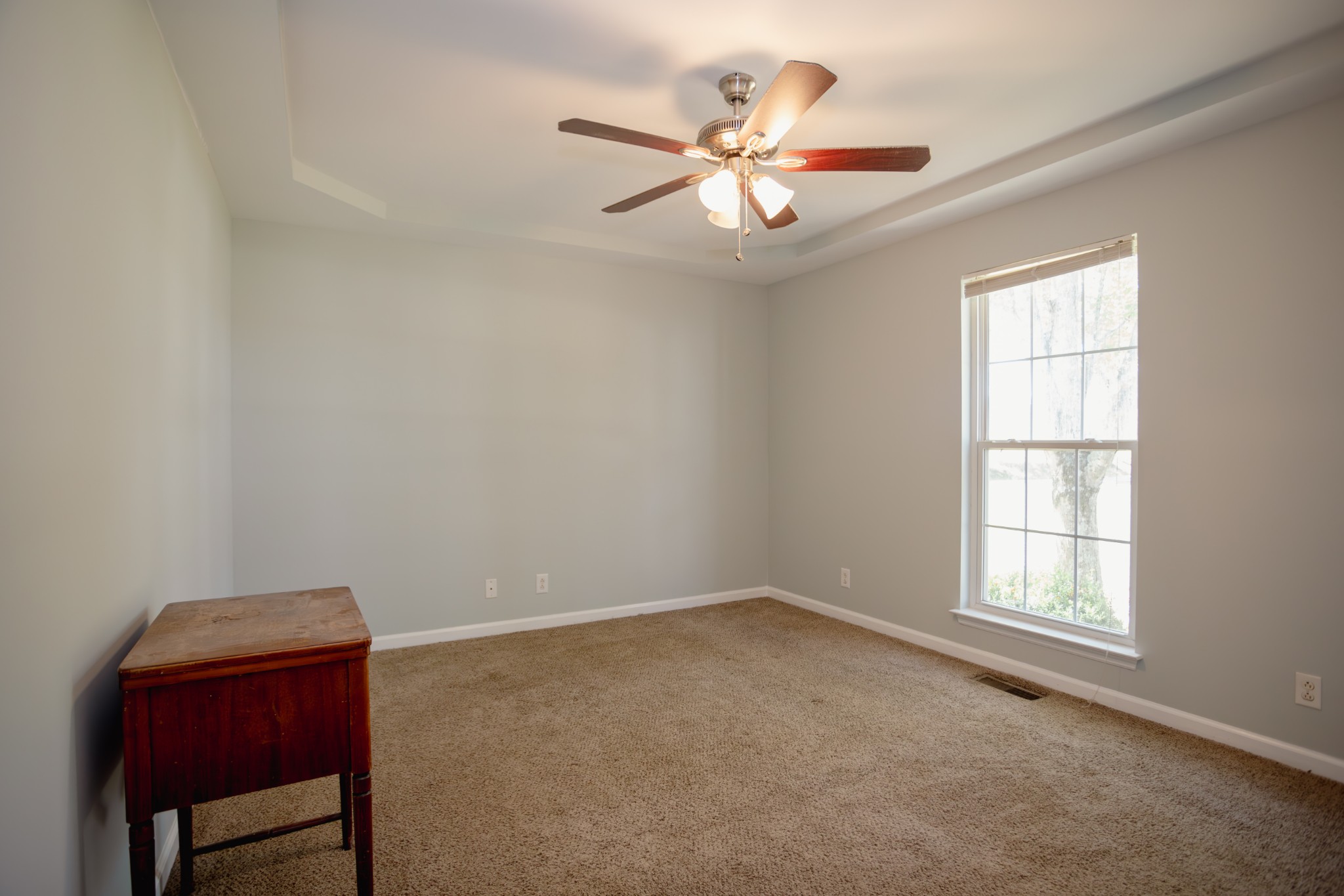 1052 Randy Road Ashland City, TN 37015 - Photo 9 of 30 an empty room with windows and fan