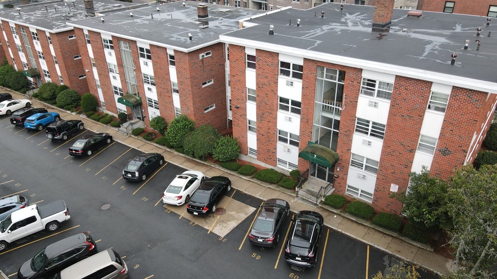 7 Commonwealth Court, Unit 5 Boston, MA 02135 - Photo 18 of 19 a view of a building with yard