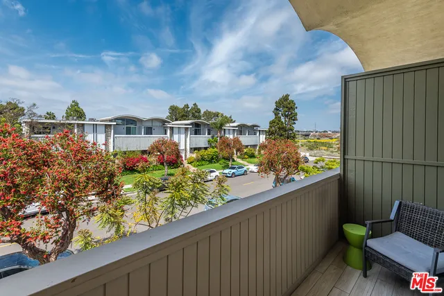 a view of a chairs in front of a building