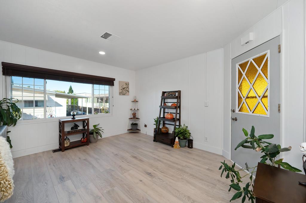 7512 Bufflehead Lane Citrus Heights, CA 95621 - Photo 15 of 52 a living room with furniture and a potted plant