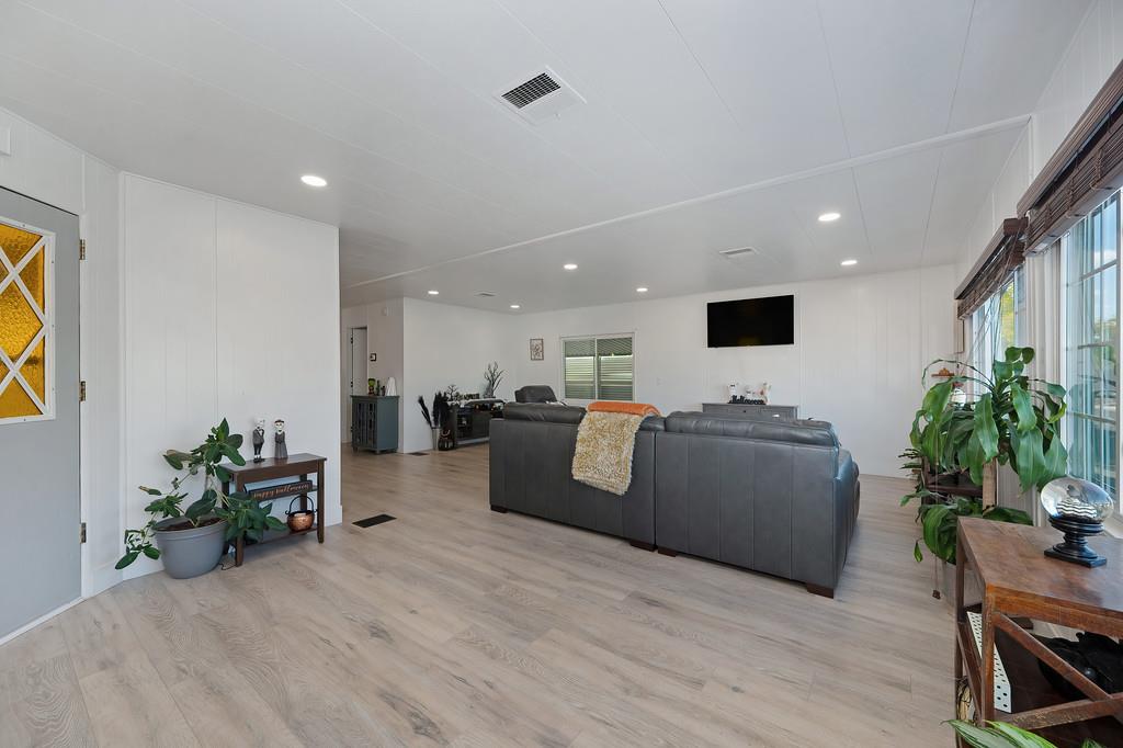 7512 Bufflehead Lane Citrus Heights, CA 95621 - Photo 16 of 52 a living room with furniture and a flat screen tv