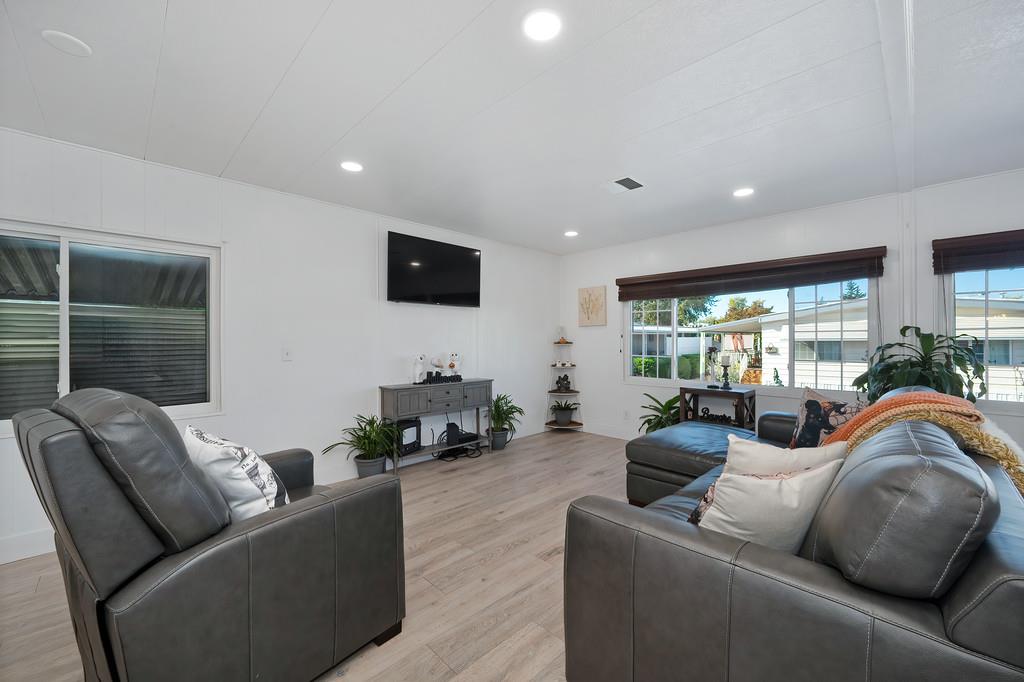 7512 Bufflehead Lane Citrus Heights, CA 95621 - Photo 19 of 52 a living room with furniture and a flat screen tv
