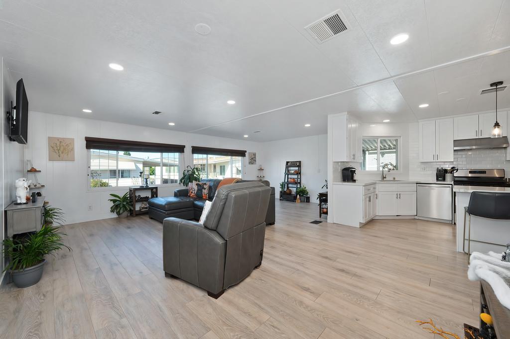 7512 Bufflehead Lane Citrus Heights, CA 95621 - Photo 20 of 52 a living room with furniture and a wooden floor