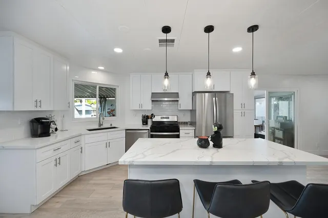 a bed room with a bed and a window