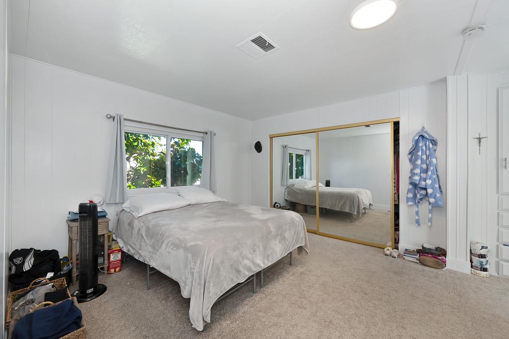 7512 Bufflehead Lane Citrus Heights, CA 95621 - Photo 29 of 52 a bed room with a bed and a window