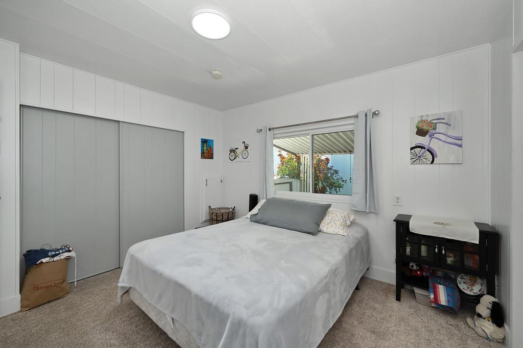 7512 Bufflehead Lane Citrus Heights, CA 95621 - Photo 36 of 52 a bedroom with a bed and a window