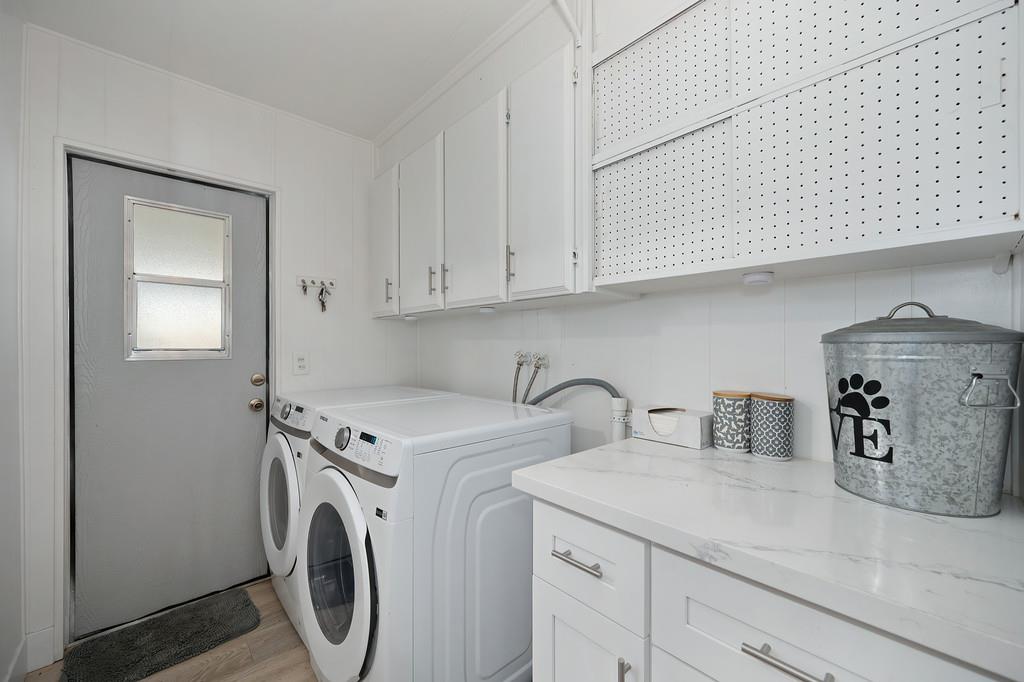 7512 Bufflehead Lane Citrus Heights, CA 95621 - Photo 40 of 52 a view of storage and utility room with washer and dryer