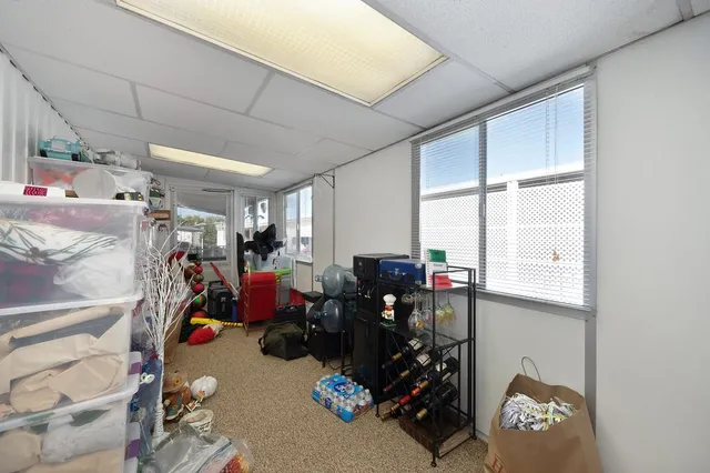 a view of a porch with seating space