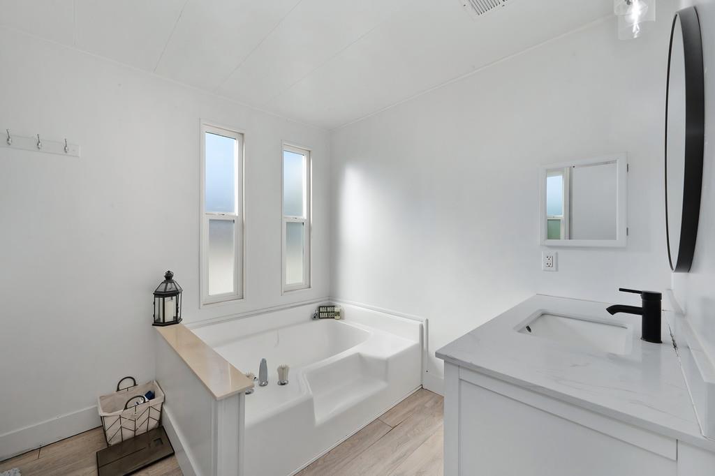 7512 Bufflehead Lane Citrus Heights, CA 95621 - Photo 5 of 52 a bathroom with a sink and a bathtub