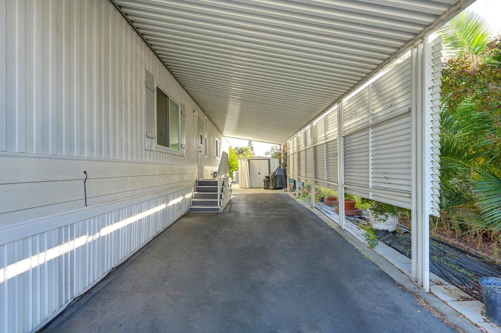 7512 Bufflehead Lane Citrus Heights, CA 95621 - Photo 10 of 52 a view of a porch with wooden stairs