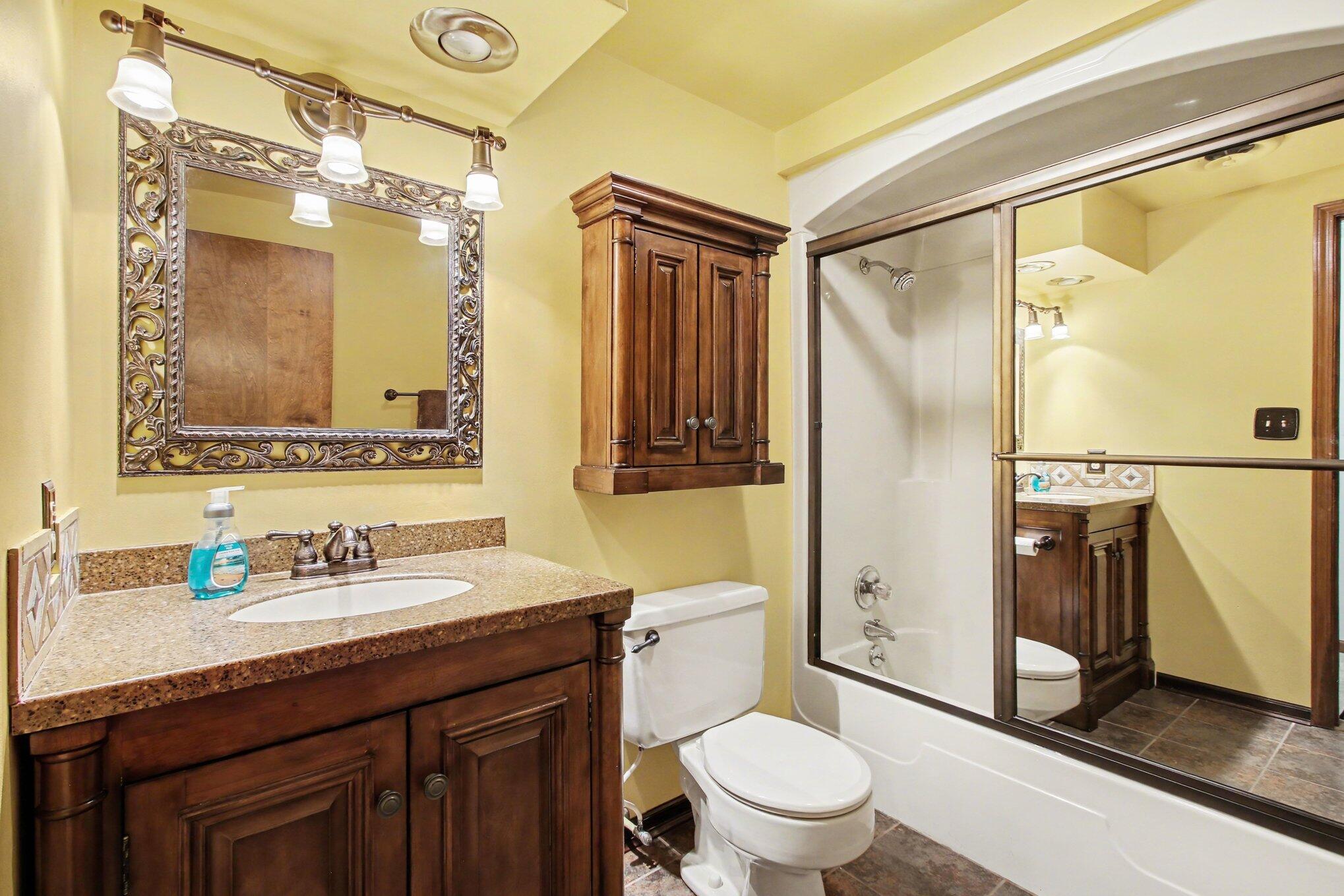 186 Wexford Road Valparaiso, IN 46385 - Photo 14 of 33 a bathroom with a granite countertop sink toilet and shower