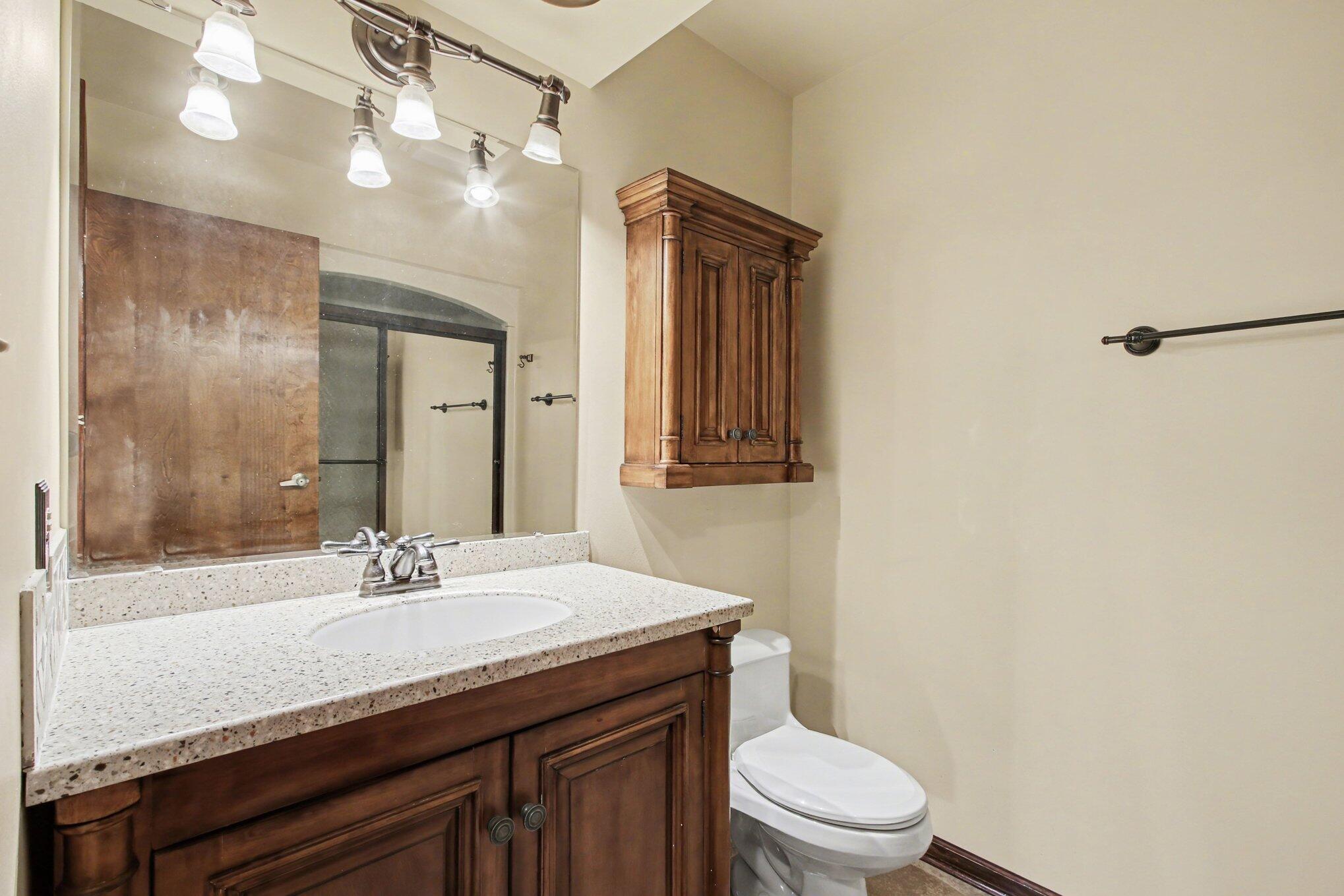 186 Wexford Road Valparaiso, IN 46385 - Photo 20 of 33 a bathroom with a sink a toilet a mirror and shower