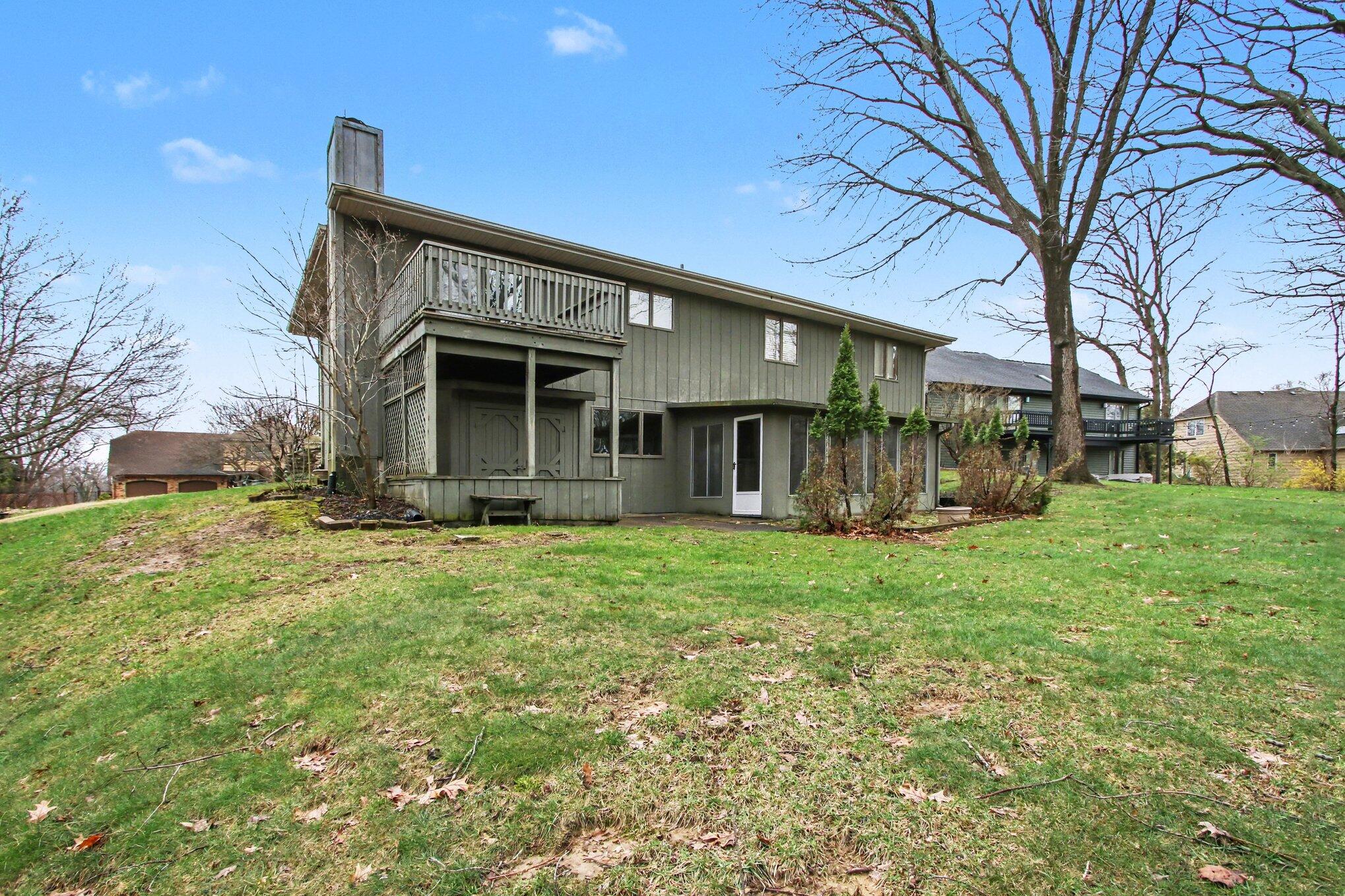 186 Wexford Road Valparaiso, IN 46385 - Photo 25 of 33 a view of a house with backyard and a tree