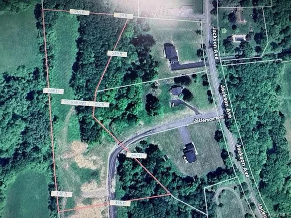 an aerial view of house with yard