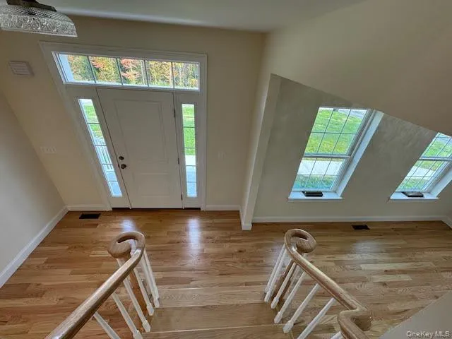 a view of a room with windows