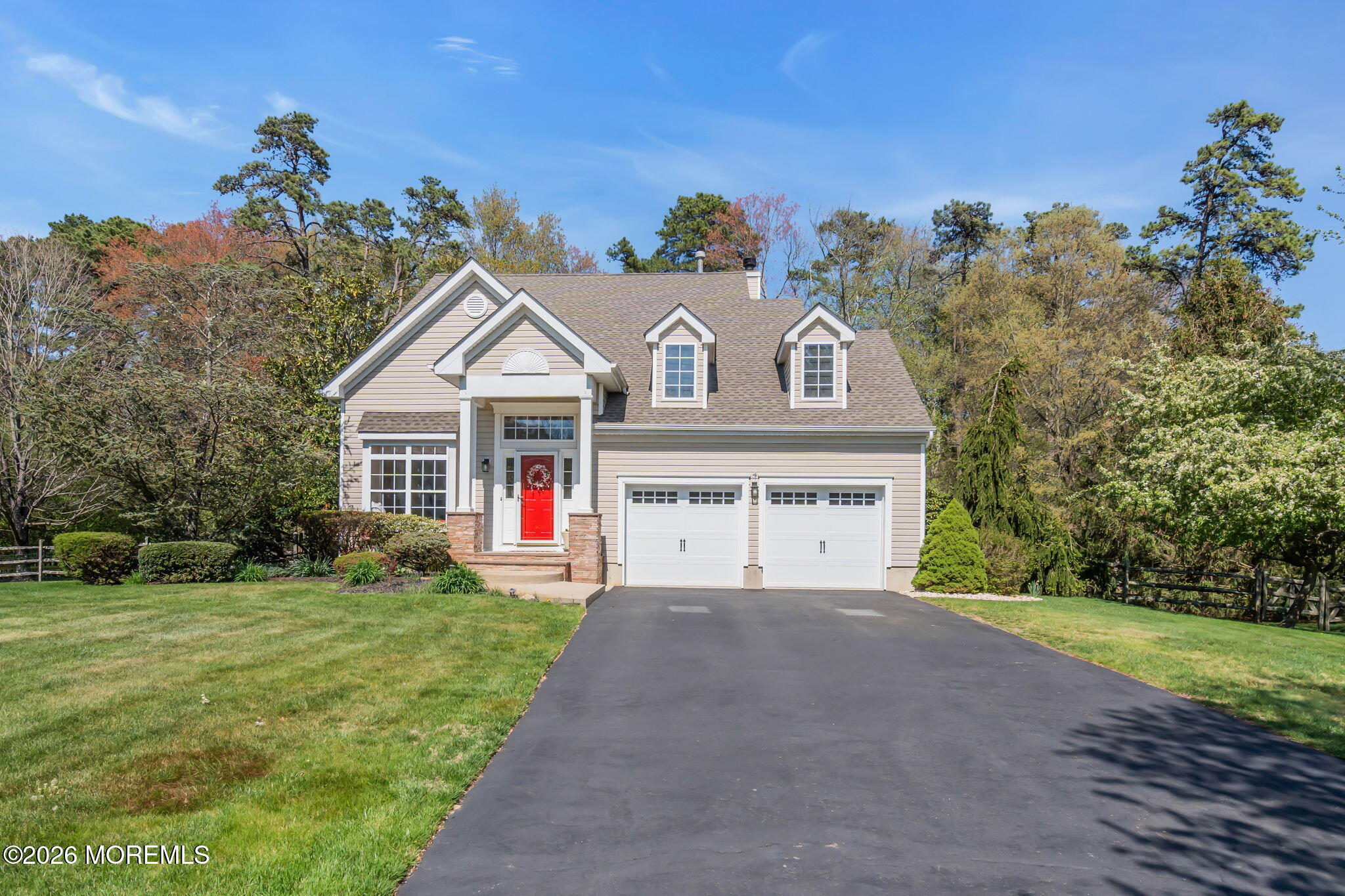 343 Nighthawk Lane Jackson, NJ 08527 - Photo 2 of 72 a front view of a house with a yard and garage