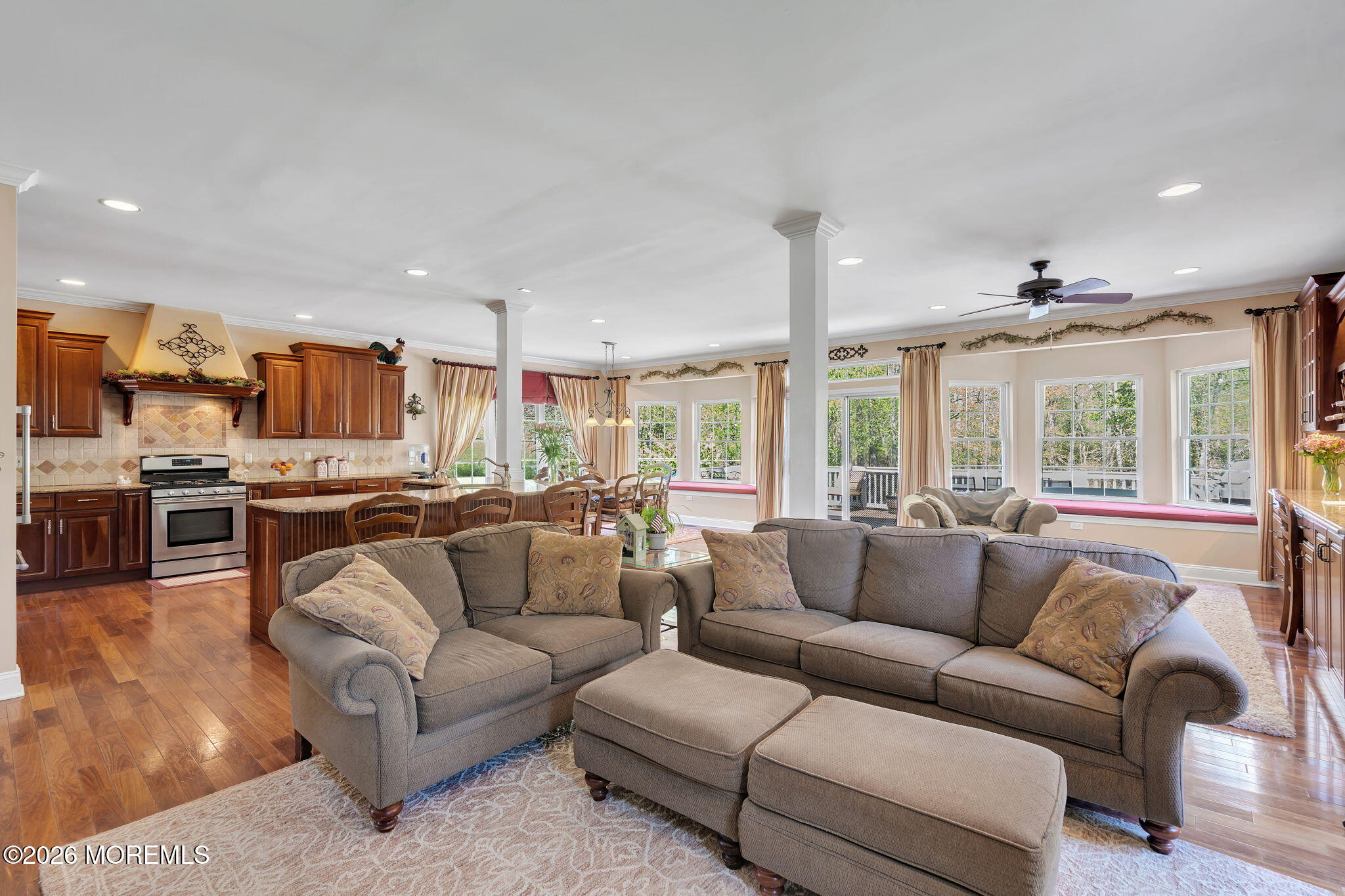 343 Nighthawk Lane Jackson, NJ 08527 - Photo 35 of 72 a living room with furniture kitchen and a large window