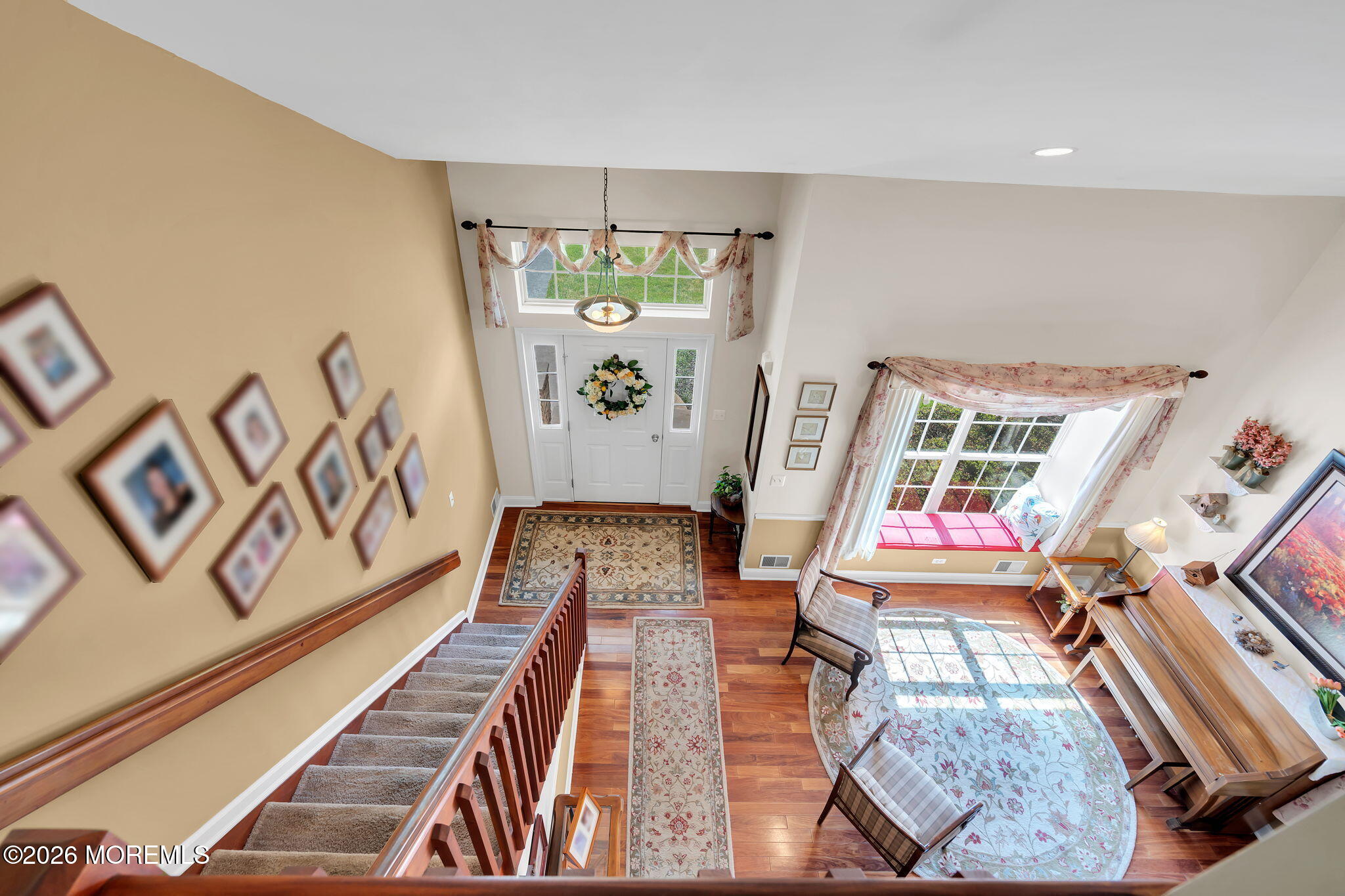 343 Nighthawk Lane Jackson, NJ 08527 - Photo 39 of 72 a living room with furniture and a wooden floor