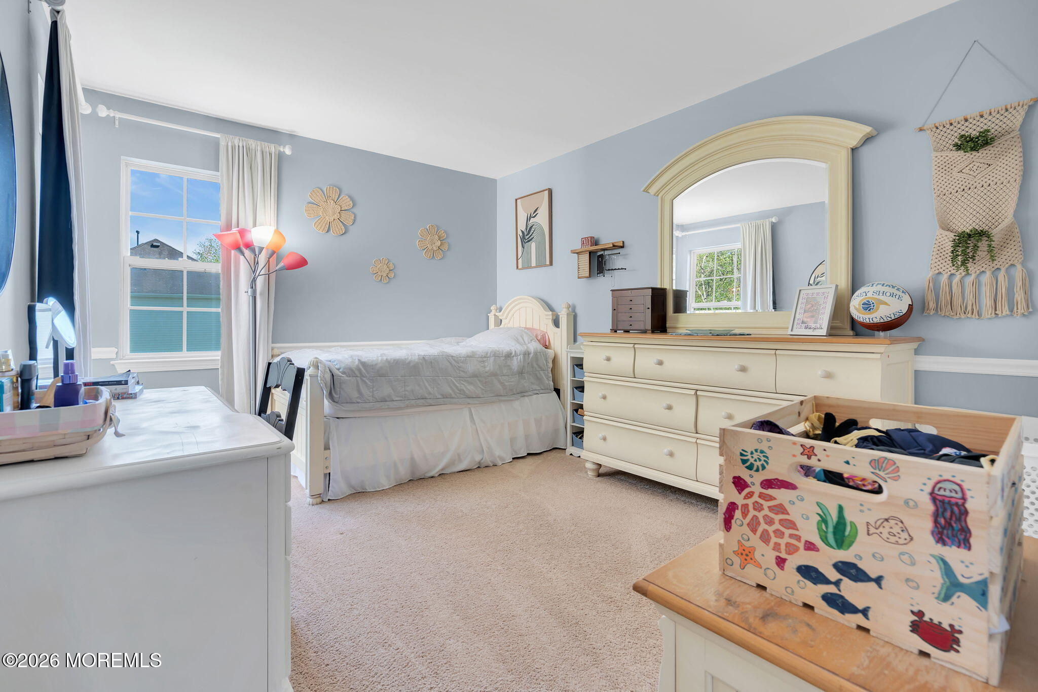 343 Nighthawk Lane Jackson, NJ 08527 - Photo 41 of 72 a spacious bedroom with a bed dresser and mirror