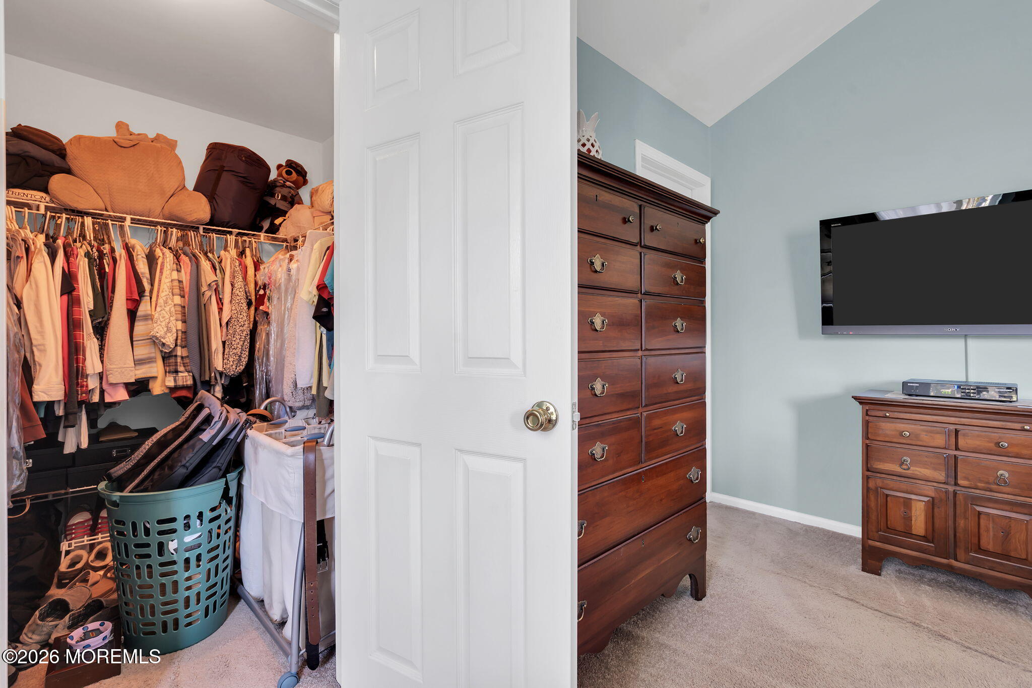 343 Nighthawk Lane Jackson, NJ 08527 - Photo 51 of 72 a bedroom with a bed and a flat tv screen