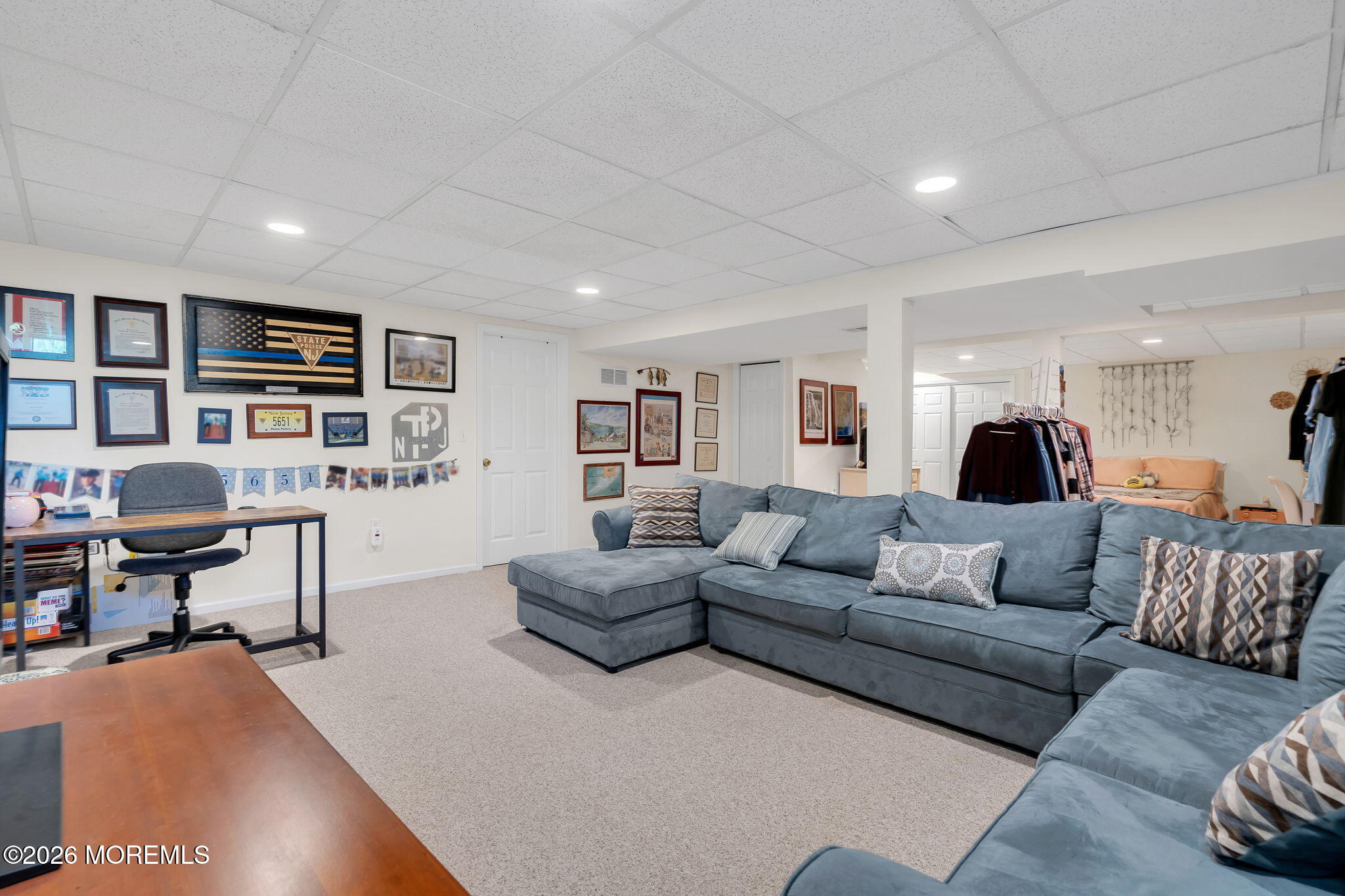 343 Nighthawk Lane Jackson, NJ 08527 - Photo 58 of 72 a living room with furniture and view of kitchen