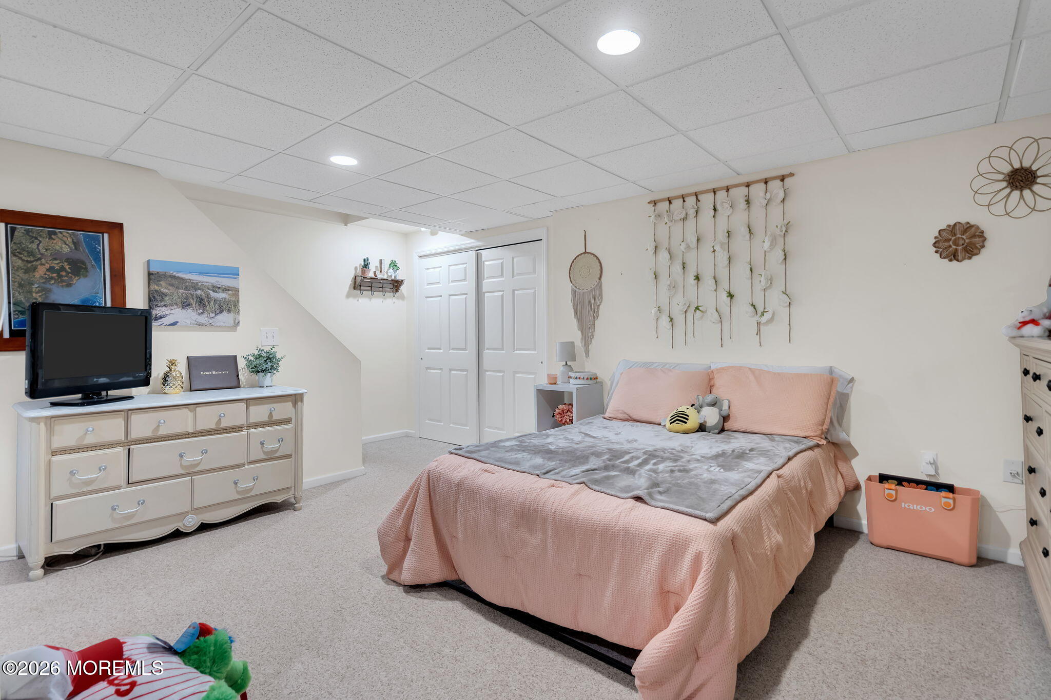 343 Nighthawk Lane Jackson, NJ 08527 - Photo 60 of 72 a bedroom with a bed and a flat screen tv