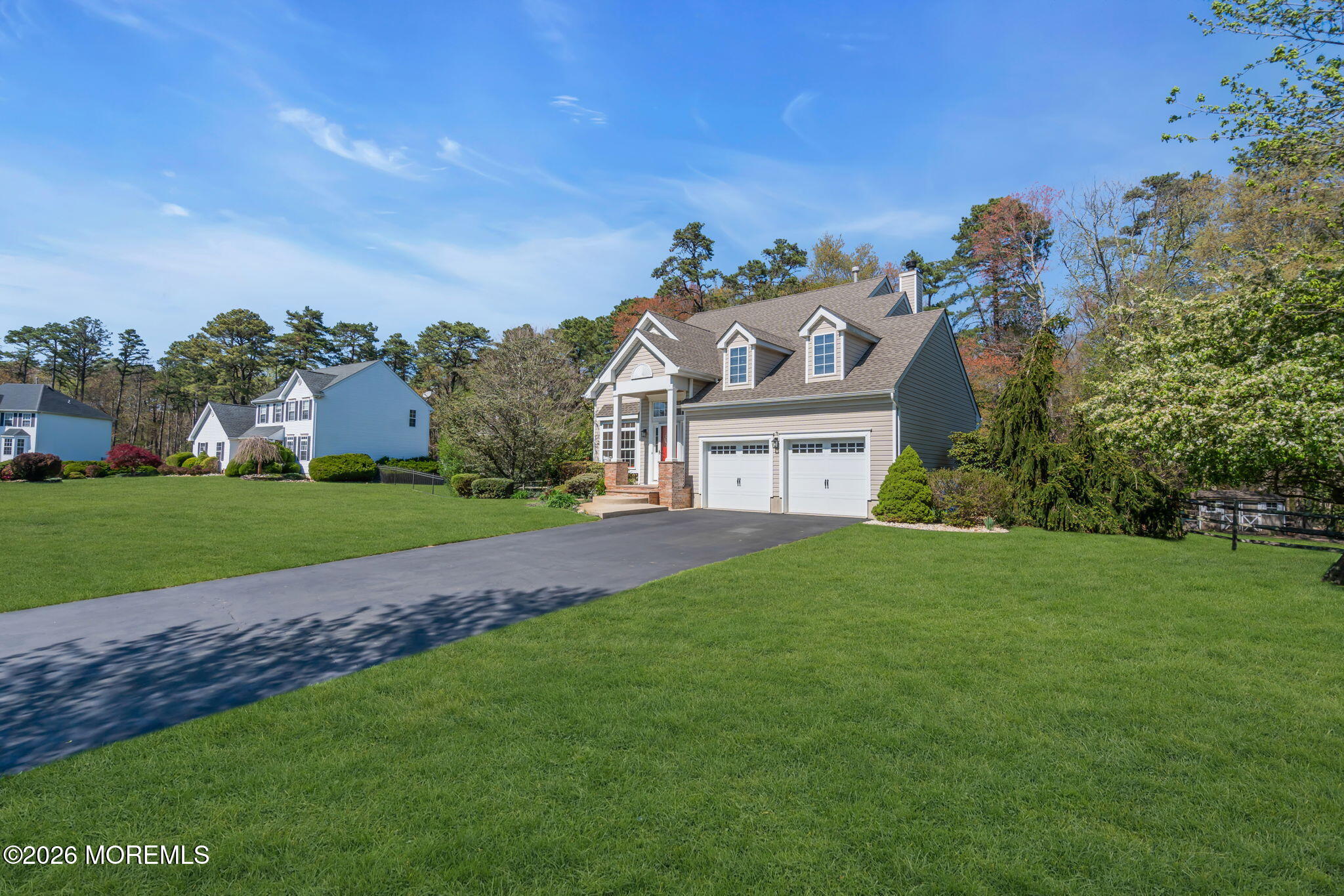 343 Nighthawk Lane Jackson, NJ 08527 - Photo 10 of 72 a front view of a house with a yard
