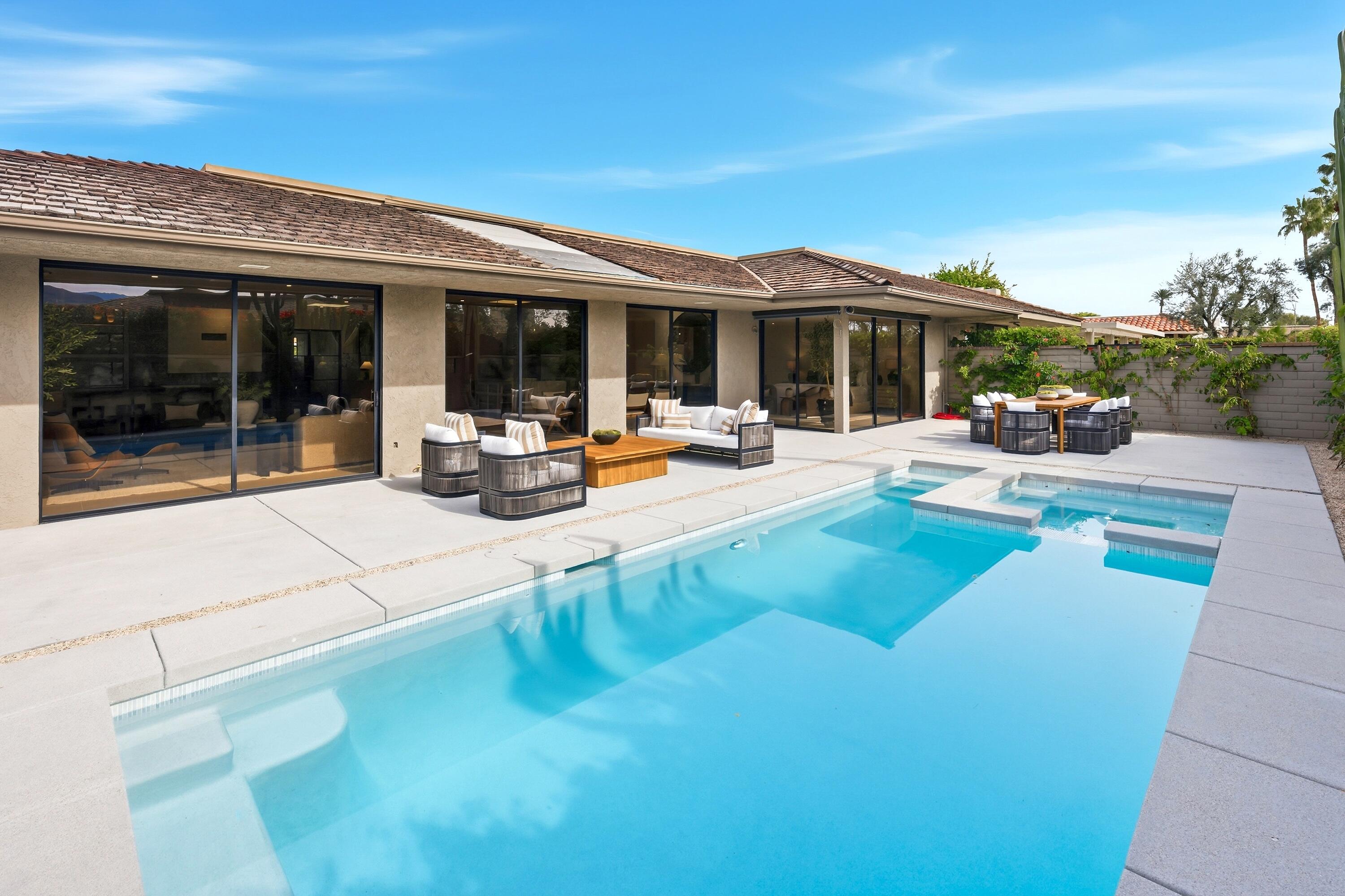 14 Rutgers Court Rancho Mirage, CA 92270 - Photo 18 of 59 a view of a house with swimming pool and sitting area