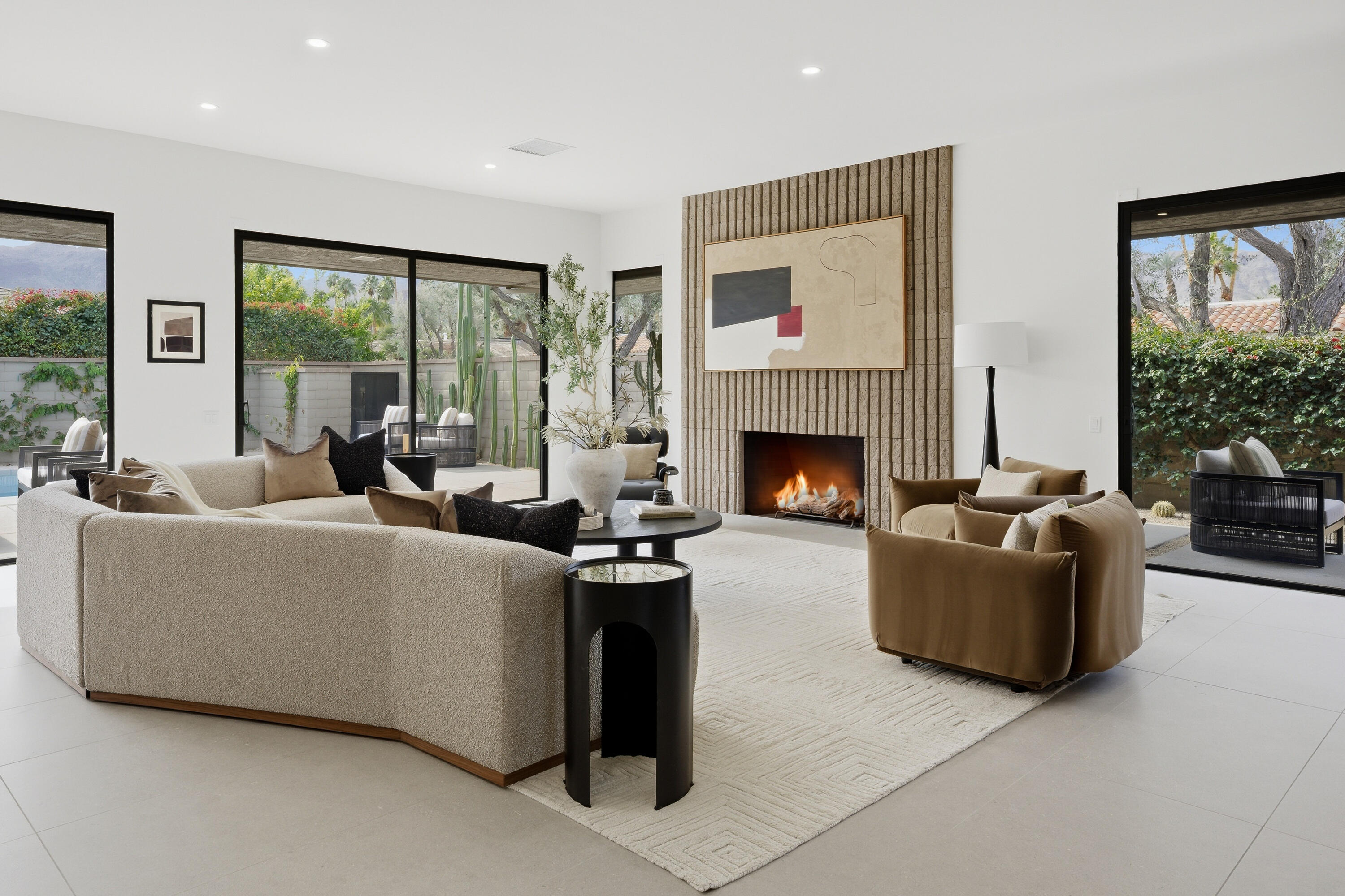 14 Rutgers Court Rancho Mirage, CA 92270 - Photo 29 of 59 a living room with furniture and a fireplace